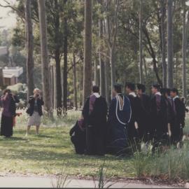 Graduates celebrating their achievement after the Faculty of Law and Commerce graduation ceremony, the University of Newcastle, Australia - 2 May 1997, 2.30pm