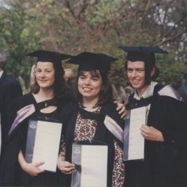 Three graduates celebrate after the Faculty of Law and Commerce graduation ceremony, the University of Newcastle, Australia - 2 May 1997, 2.30pm