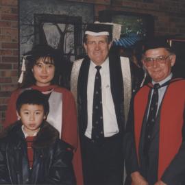 Vice-Chancellor Roger Holmes and unidentified people at the Faculty of Science / Maths graduation ceremony, the University of Newcastle, Australia - 9 May 1997, 6pm