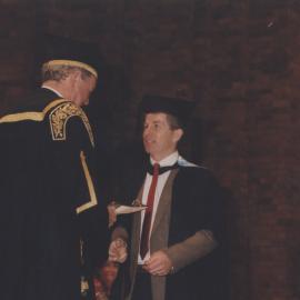 A graduating student ready to receive his testamur, 8 May 1997, 10.30pm, the University of Newcastle, Australia