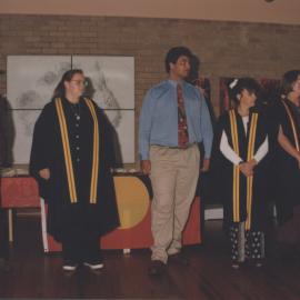 Graduating students celebrate after the student graduation ceremony,  8 May 1997, 10.30am, the University of Newcastle, Australia