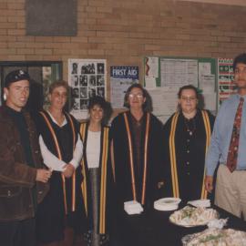 Graduating students celebrate after the student graduation ceremony,  8 May 1997, 10.30am, the University of Newcastle, Australia