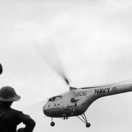 Navy helicopter rescues stranded Maitland Flood victims in 1955:  Lucey Collection