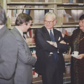 An unidentified man, Harrison Bryan and Pat Flowers at the 500,000th book presentation, Auchmuty library, the University of Newcastle, Australia - 10 August 1984