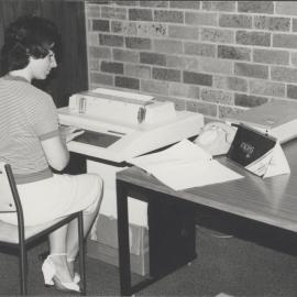 Anne Robinson from the Auchmuty Library, the University of Newcastle, Australia, conducting a DIALOG search