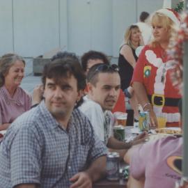 Dawn Byrnes, (obscured - Loo Jansen and Susan McDonald) at a Library Christmas Party, Auchmuty Library Roof Garden, the University of Newcastle, Australia - 1997