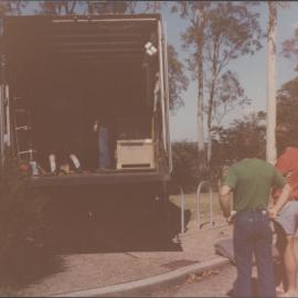 Photograph taken at the acquisition and installation of the University's VAX 11-780 computer, c. 1980