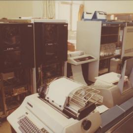 Photograph taken at the acquisition and installation of the University's VAX 11-780 computer, c. 1980