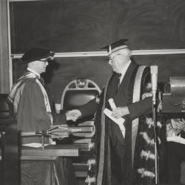 The Chancellor of the University of Newcastle, Australia congratulates Sir Macfarlane Burnett at the opening of the Biological Sciences Building