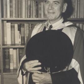C.B. Cutler photographed in Vice-Chancellor Auchmuty's office: University of Newcastle, Australia