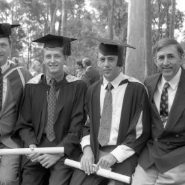 Professor Eric Colhoun (Geography) with his son, Robert Colhoun (Bachelor of Science in Aviation), an unidentified graduate and unidentified man, the University of Newcastle, Australia - 30 April 1993