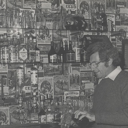John Armstrong, editor of the University News describing various archival photographs