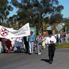 Banner of the Health and Research Employees Association leading the Save Kurri Hospital - March, Lang Street,  Kurri Kurri, NSW, September 1989
