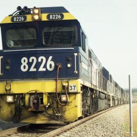 8226 and two other 82 class locos stopped at a signal on the relief road between Whittingham and Minibah new the Golden Highway overbridge, March 2012.