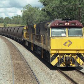 A QR coal train heading north at Minimbah, NSW