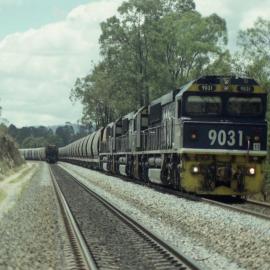 9031 - A down coal train has just gone past.