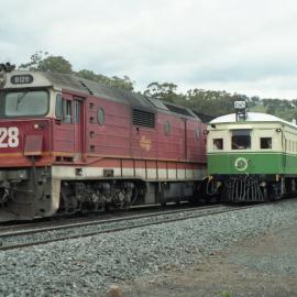 CPH's 1 and 7 cross an up coal train at Ardglen, NSW
