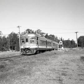 638 at Blackalls, passing Bus Stop sign, 9 March 1990, Fassifern - Toronto Line.