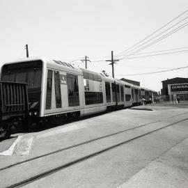 Victorian Railways MET set, crossing Broadmeadow Rd from Goninans, 9 December 1991