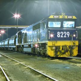 8229 on a grain train on SIX departure at Port Waratah.