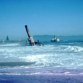 Wreck of Koondooloo, a Newcastle vehicular ferry & showboat Sydney Queen on beach at Trial Bay, South West Rocks, NSW, January 1972