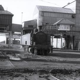 S.M.R. 23 coming from under the plant, Hexham Exchange Sidings, 17 October 1973