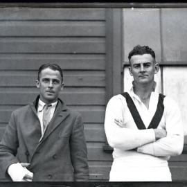 Rugby player with man in a coat, [1930s]