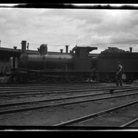 TGR C Class locomotive, number not legible, on turntable at Hobart roundhouse, '232' written on reverse of negative [n.d.]