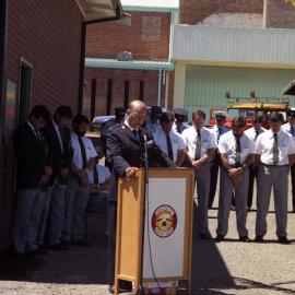 Salvation Army Officer leading prayer at the opening of the Kurri Kurri Rescue Squad building, 24 November 1990