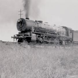 NSWGR D57 Class No. 5713 4-8-2 Mountain Type heavy goods locomotive on up goods approaching Emu Plains, [1930s]