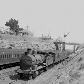 NSWGR D50 Class No. 5263 2-8-0 Consolidation Type standard goods locomotive departing Wollongong with a passenger service [1930s]