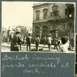 "British Tommy guards convicts at work", World War 1