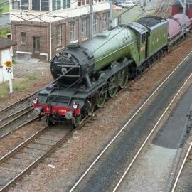 Former London & North Eastern Railway (LNER) Class A3 Locomotive 4472 'Flying Scotsman' drifts past Broadmeadow South box before stopping at Broadmeadow, NSW