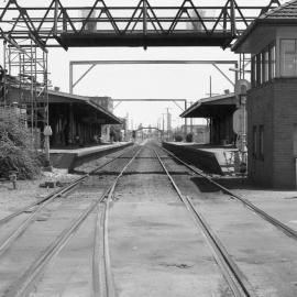 Wickham station with foot bridge being raised for electrification, October 1982