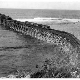 The Wallarah Coal Co. Jetty at Catherine Hill Bay, NSW, showing trucks of coal awaiting shipment