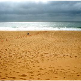Giant red ribbon for World AIDS Day Newcastle Beach