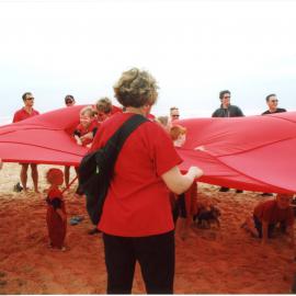 Giant red ribbon for World AIDS Day Newcastle Beach