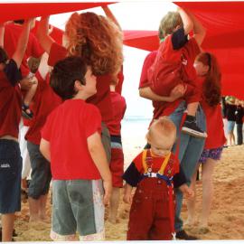 Giant red ribbon for World AIDS Day Newcastle Beach