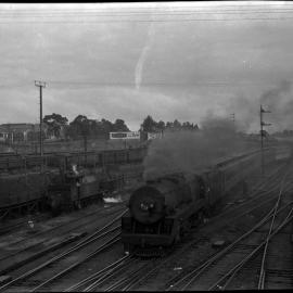 SAR 500 Class locomotive, no. 500 "James McGuire", and F Class no. 251, Adelaide area, [1926-1962]