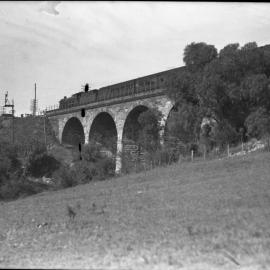 NSWGR stone viaduct, with C36 Class and passenger carriages, Stonequary Creek, Picton