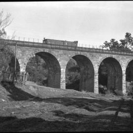 NSWGR stone viaduct, with railcar, Stonequary Creek, Picton, NSW [n.d.]