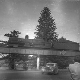 NSWGR C32 Class, no. 3377, on Terralong Street overpass, Kiama, [1940-1950]