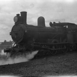 TGR Ab Class, at coal stage, fireman's arm visible behind cab, [Launceston, Tasmania]