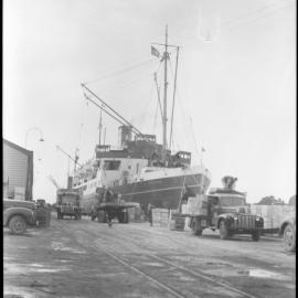 Merchant vessel [Pasadena] on loading dock, unidentified location, [n.d.]