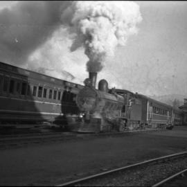 TGR Ab Class, leaving major station with passenger carriages, [Hobart, Tasmania]