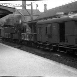 NSWGR C32 Class and carriages, at station, unidentified location, [n.d.]