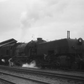 NSWGR AD60 Garratt, number not visible, D55 in background, at Picton, [n.d.]