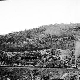 NSWGR D53 Class locomotives, freight train, rugged terrain, unidentified location, [n.d.] 1