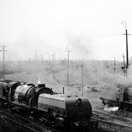 NSWGR AD60 Garratt and C32, numbers not legible, Enfield South, [n.d.]