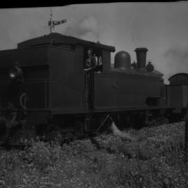 WAGR N Class, no. 200, running tender first with freight, unidentified location, [n.d.]